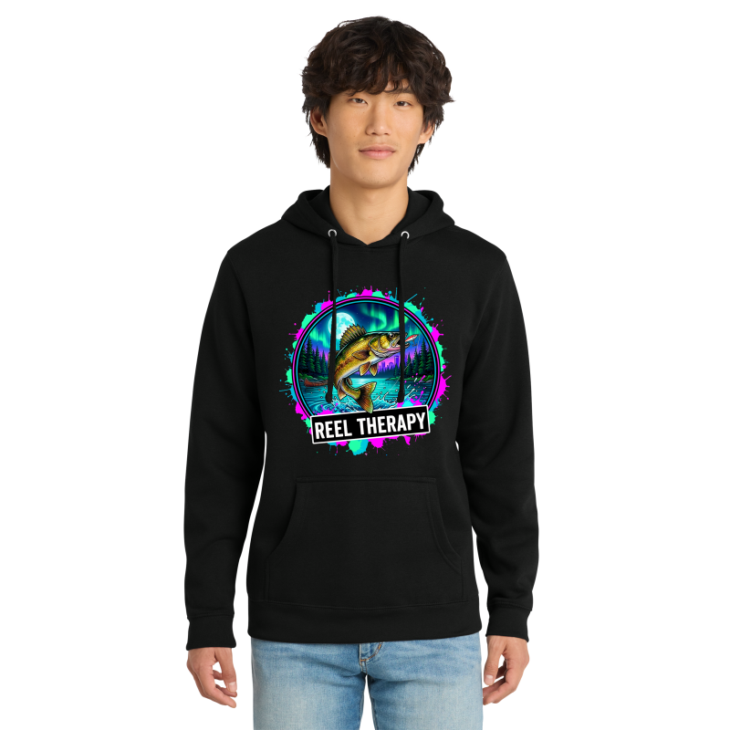 Person wearing a black hoodie with 'Reel Therapy' graphic design on a white background