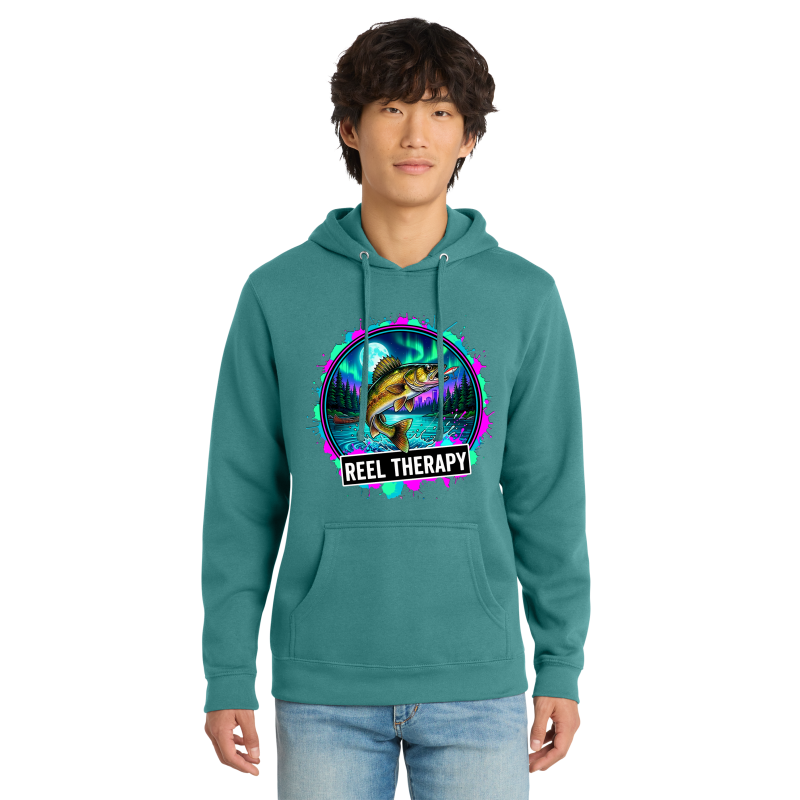 Person wearing a teal hoodie with 'Reel Therapy' graphic design on a white background