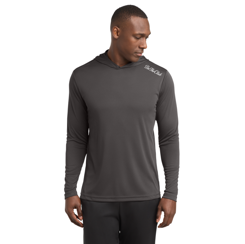 Man wearing a gray hoodie with a brand logo on a white background