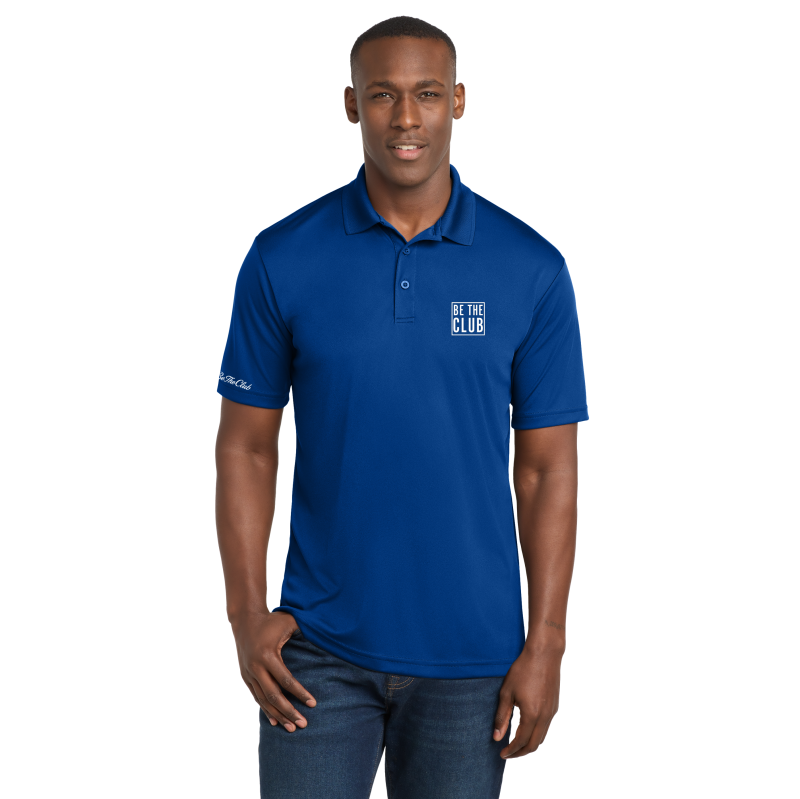 Man wearing a blue polo shirt with a logo on a white background
