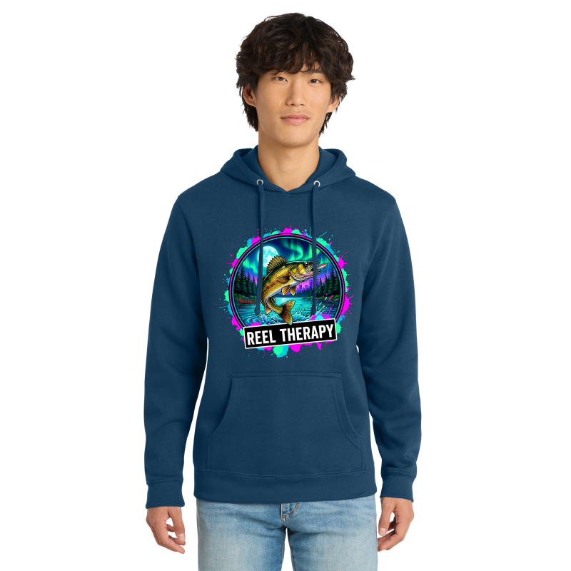 Person wearing a navy blue hoodie with 'Reel Therapy' graphic design on a white background