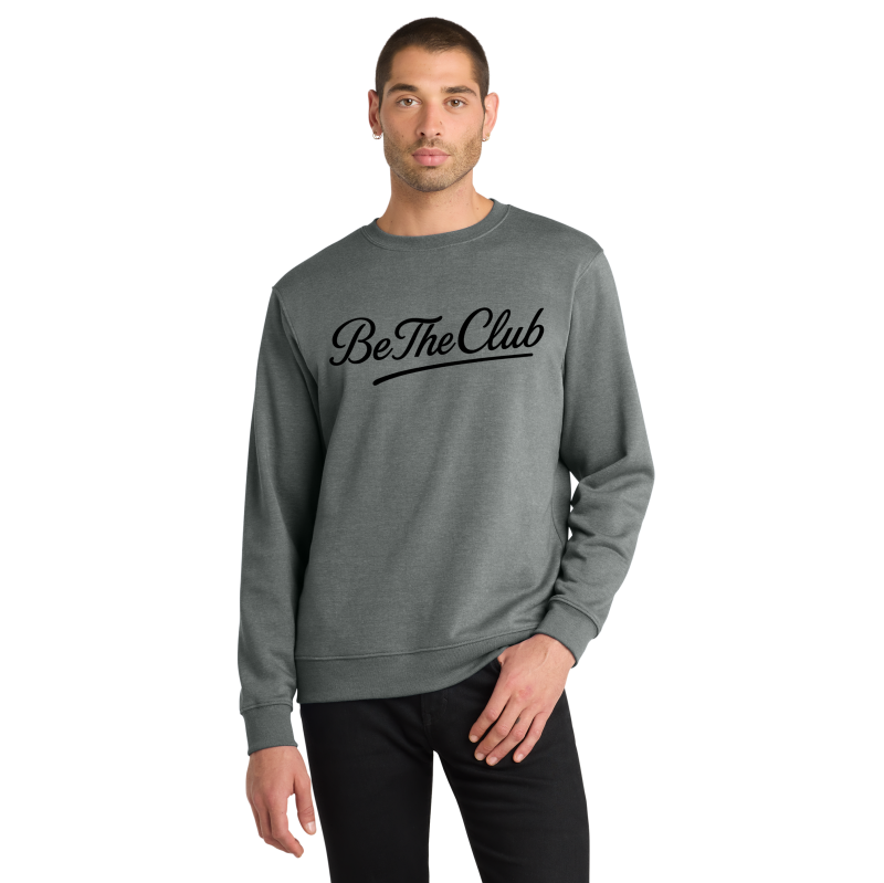 Man wearing a gray sweatshirt with 'Be The Club' text on a white background