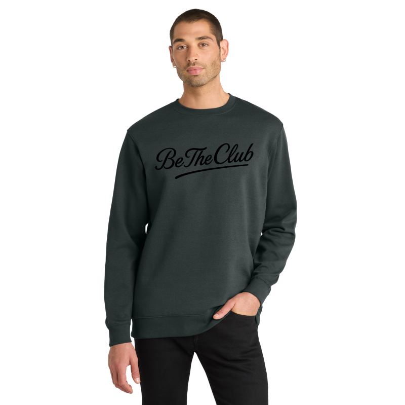 Man wearing a dark gray sweatshirt with 'Be The Club' text on a white background