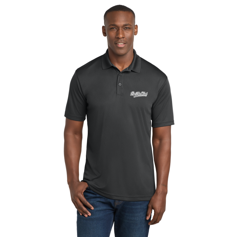 Man wearing a black polo shirt with a logo on a white background