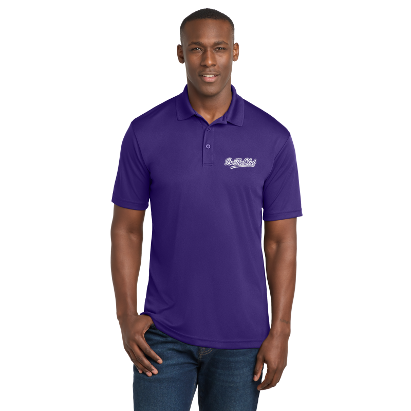 Man wearing a purple polo shirt with a logo on a white background