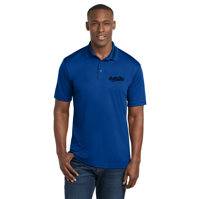 Man wearing a blue polo shirt with a logo on a white background