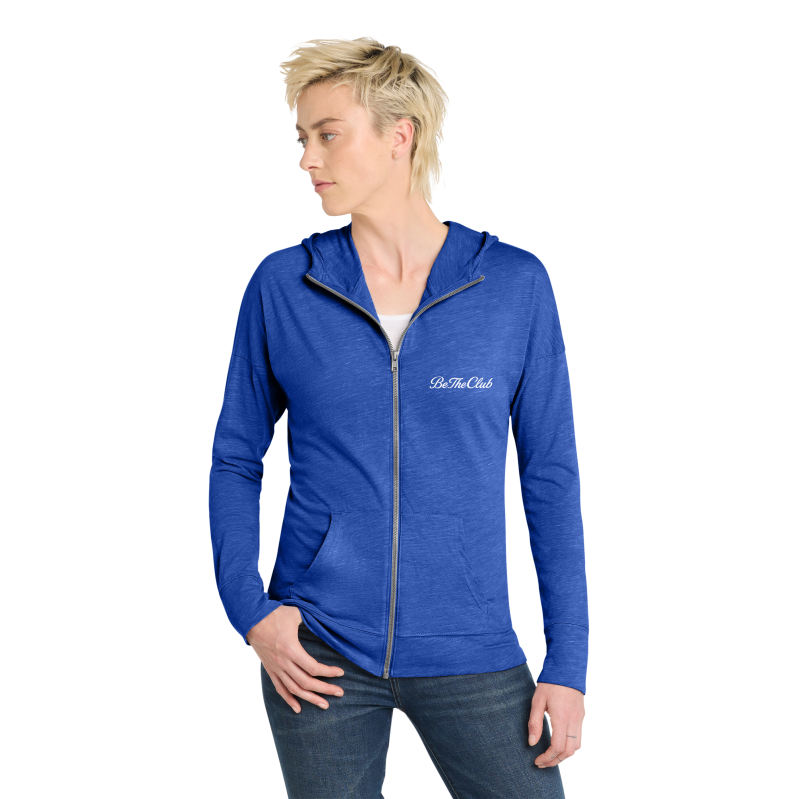 Woman wearing a blue hoodie with 'Do The Club' logo on a white background