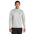 Man wearing a gray quarter-zip pullover with a logo on a white background